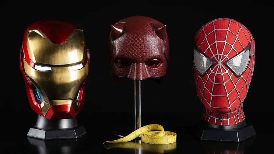 Iron Man MK50 helmet, Daredevil Born Again mask and Tobey Maguire Spider-Man mask with a measuring tape