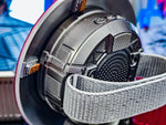 Back of the Captain America shield speaker showing the grille, buttons and wristband