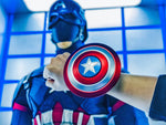 Captain America shield speaker carried by its Velcro wristband