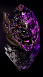 Megatron helmet under purple light with both eyes glowing and the Decepticon badge on the forehead