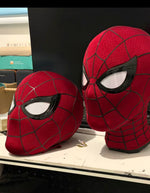 Two Spider-Man Brand New Day masks side by side on a workbench