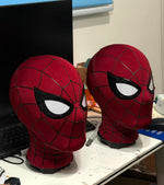 Pair of Brand New Day Spider-Man masks on display stands