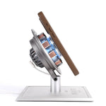 Phone charging wirelessly against the Iron Man Arc Reactor charger