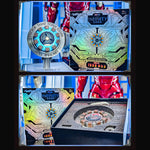 Iron Man Arc Reactor beside its Infinity Saga box and shown unboxed