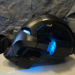 Dark Edition Iron Man MK17 helmet with the jaw open and the blue side module lit
