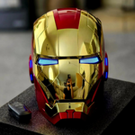 Gold Iron Man MK5 helmet with its remote control beside it