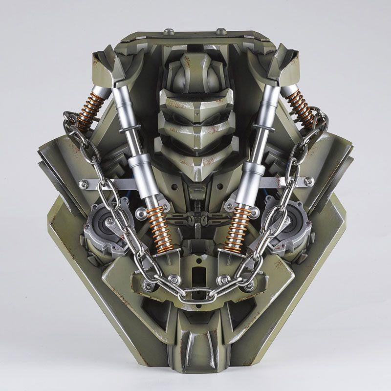 Megatron helmet stand sculpted as a Decepticon torso with chains and pistons