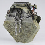 Back three-quarter view of the weathered Megatron helmet stand