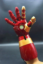 Open hand of the wearable Iron Man MK42 arm with the repulsor glowing